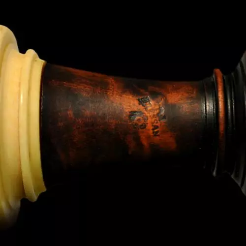 end piece with stamp 