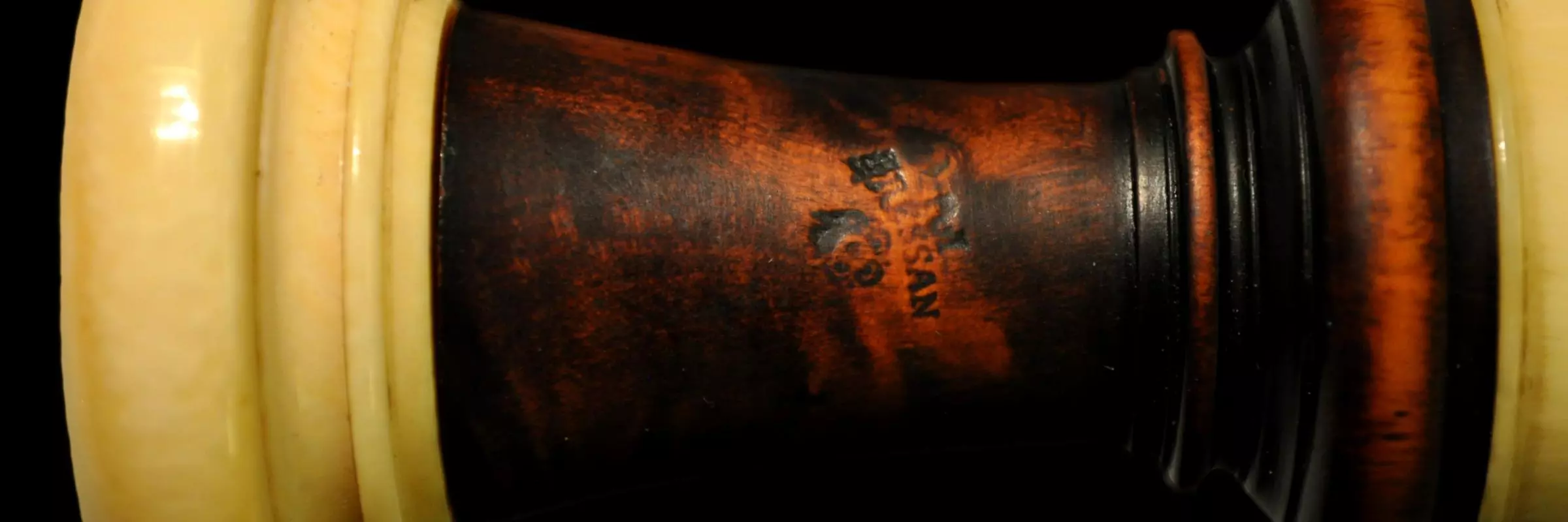 end piece with stamp 